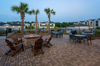 Outdoor Grilling and Entertainment Area at Abberly Crossing Apartment Homes by HHHunt, Ladson, SC, 29456